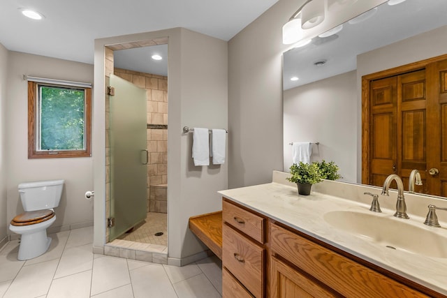 674 Mound Ave, Shoreview, MN 55126 - bathroom with vanity, a shower stall, tile patterned floors, and recessed lighting