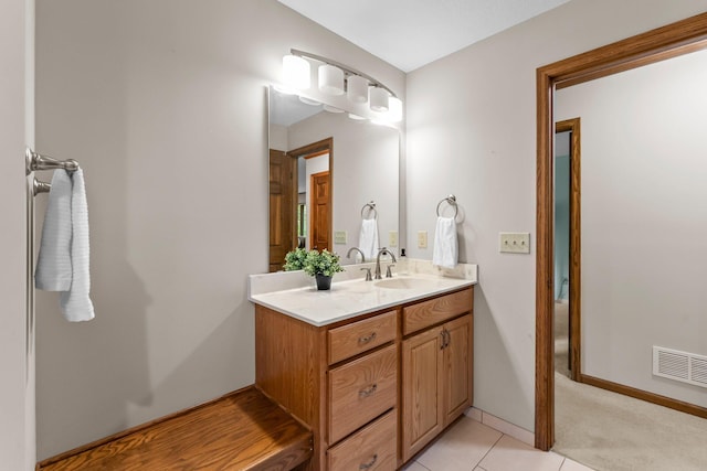 674 Mound Ave, Shoreview, MN 55126 - bathroom with vanity and tile patterned flooring