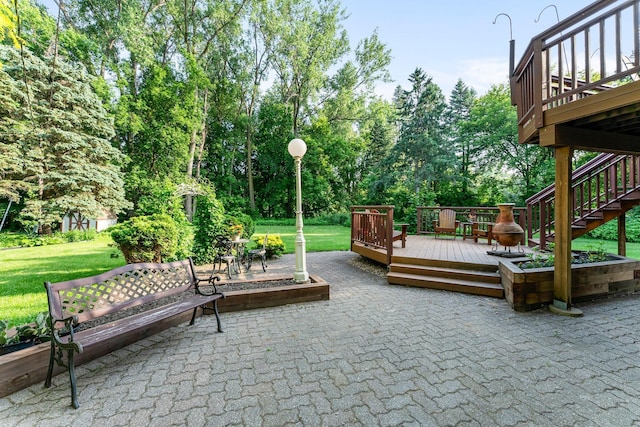 674 Mound Ave, Shoreview, MN 55126 - view of patio / terrace with a deck, stairway, and view of wooded area