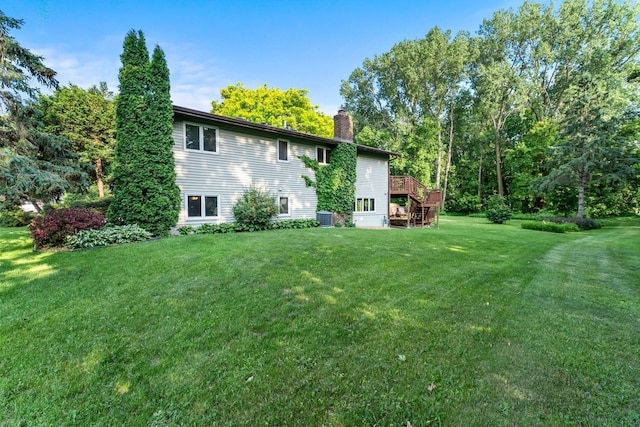 674 Mound Ave, Shoreview, MN 55126 - back of house featuring a chimney, stairs, a yard, and a deck
