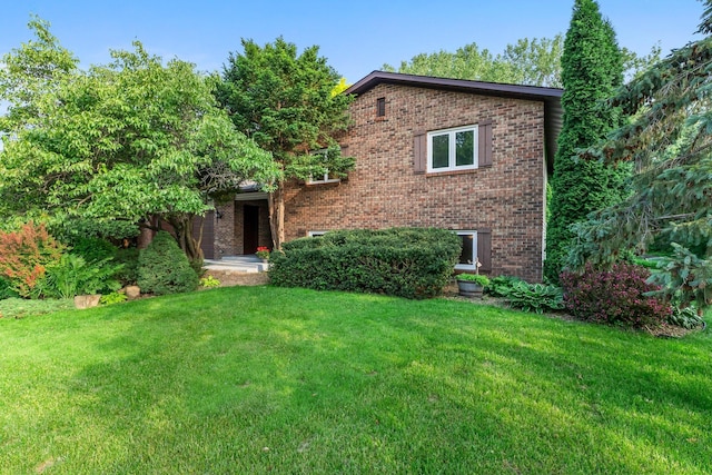 674 Mound Ave, Shoreview, MN 55126 - view of front of property featuring a front lawn and brick siding