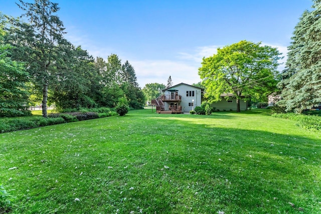 674 Mound Ave, Shoreview, MN 55126 - view of green lawn featuring a deck