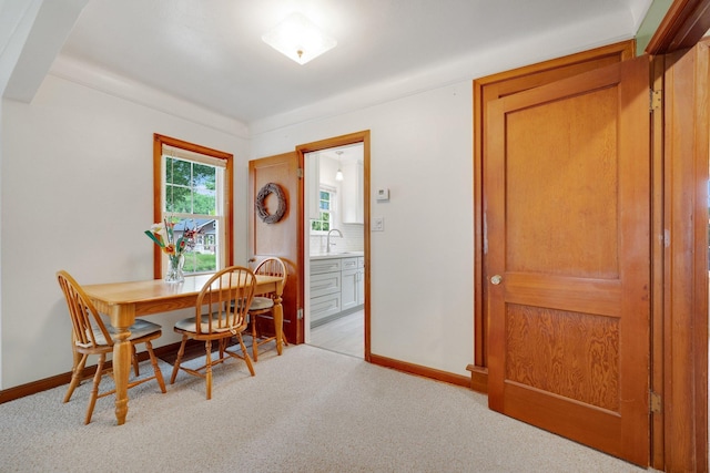 3243 Cleveland St NE, Minneapolis, MN 55418 - dining space featuring light carpet and baseboards