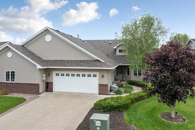 145 Bluebird Ln, Clearwater, MN 55320 - view of front of house featuring brick siding, concrete driveway, an attached garage, and roof with shingles