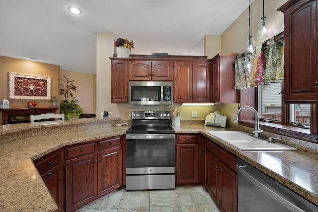 145 Bluebird Ln, Clearwater, MN 55320 - kitchen featuring stainless steel appliances, a sink, hanging light fixtures, light countertops, and recessed lighting