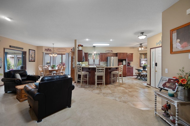 145 Bluebird Ln, Clearwater, MN 55320 - living room featuring a chandelier, light colored carpet, recessed lighting, and a ceiling fan