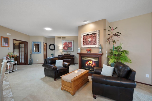 145 Bluebird Ln, Clearwater, MN 55320 - living room with light colored carpet, a glass covered fireplace, and baseboards