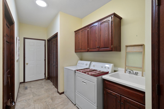 145 Bluebird Ln, Clearwater, MN 55320 - washroom with washer and dryer, cabinet space, and baseboards