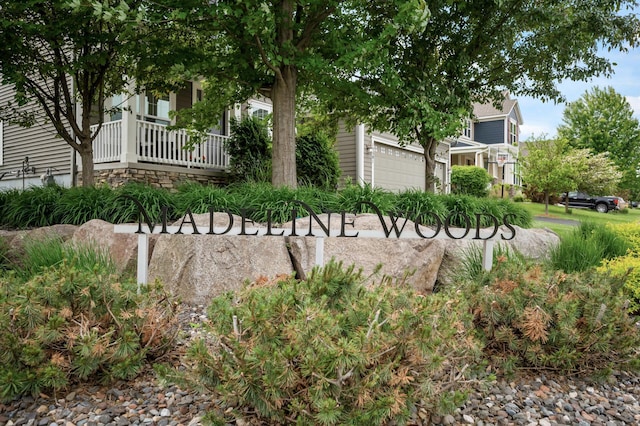18301 100th Ave N, Osseo, MN 55311 - view of yard featuring an attached garage