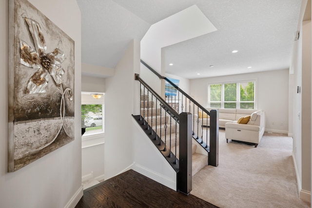 18301 100th Ave N, Osseo, MN 55311 - stairway featuring baseboards and recessed lighting