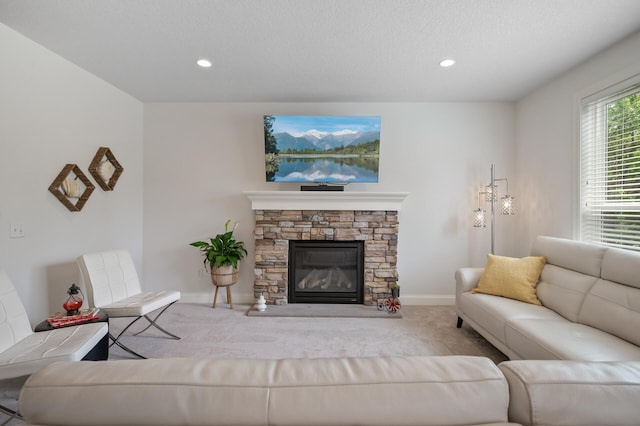 18301 100th Ave N, Osseo, MN 55311 - carpeted living area featuring baseboards, recessed lighting, and a stone fireplace