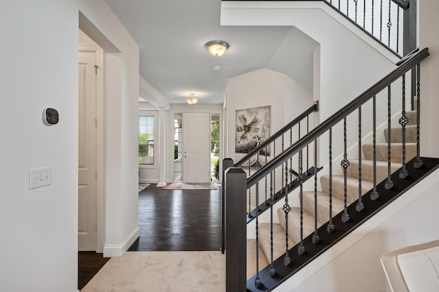 18301 100th Ave N, Osseo, MN 55311 - foyer featuring wood finished floors, stairs, and baseboards