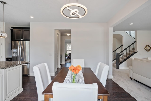 18301 100th Ave N, Osseo, MN 55311 - dining space with a chandelier, dark wood finished floors, stairs, baseboards, and recessed lighting