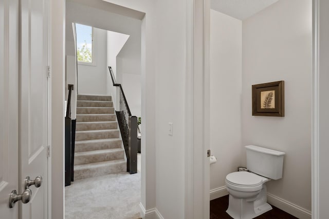 18301 100th Ave N, Osseo, MN 55311 - bathroom featuring toilet and baseboards