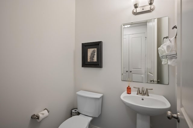 18301 100th Ave N, Osseo, MN 55311 - half bathroom with toilet and a sink