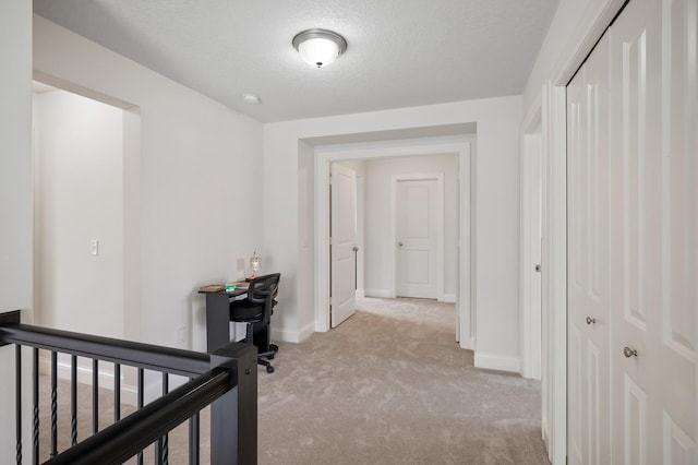18301 100th Ave N, Osseo, MN 55311 - hall featuring carpet, baseboards, an upstairs landing, and a textured ceiling