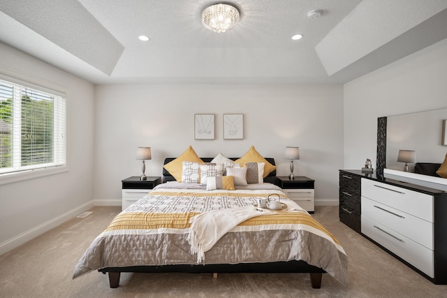 18301 100th Ave N, Osseo, MN 55311 - bedroom with a raised ceiling, light carpet, baseboards, a textured ceiling, and recessed lighting