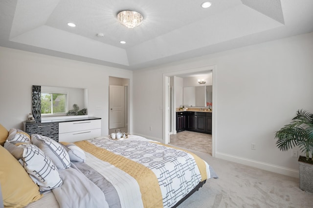 18301 100th Ave N, Osseo, MN 55311 - bedroom with a tray ceiling, light colored carpet, baseboards, ensuite bath, and recessed lighting