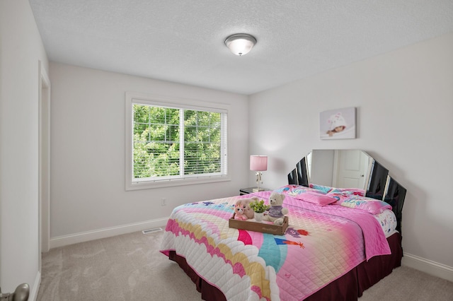 18301 100th Ave N, Osseo, MN 55311 - bedroom featuring carpet floors, baseboards, and a textured ceiling
