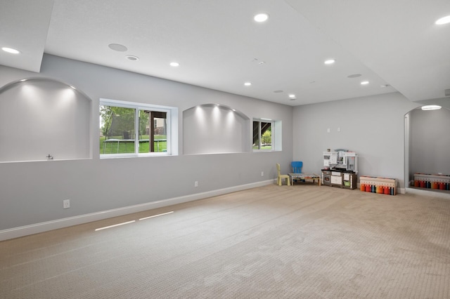 18301 100th Ave N, Osseo, MN 55311 - playroom with arched walkways, recessed lighting, plenty of natural light, carpet floors, and baseboards