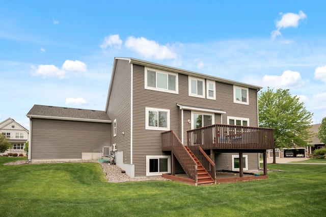 18301 100th Ave N, Osseo, MN 55311 - back of house with a wooden deck, a lawn, central AC unit, and stairway