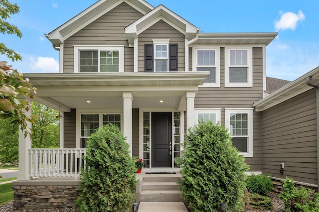 18301 100th Ave N, Maple Grove, MN 55311 - view of front facade with a porch