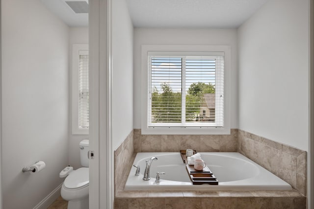 18301 100th Ave N, Maple Grove, MN 55311 - full bathroom with a garden tub and toilet