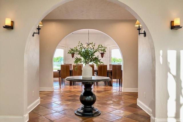 24534 474th Ln, Elysian Twp, MN 56028 - entryway with plenty of natural light, baseboards, and arched walkways