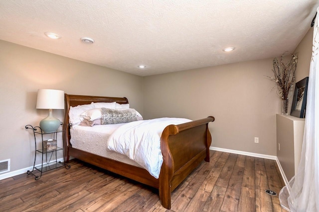 24534 474th Ln, Elysian Twp, MN 56028 - bedroom featuring wood finished floors, baseboards, and recessed lighting