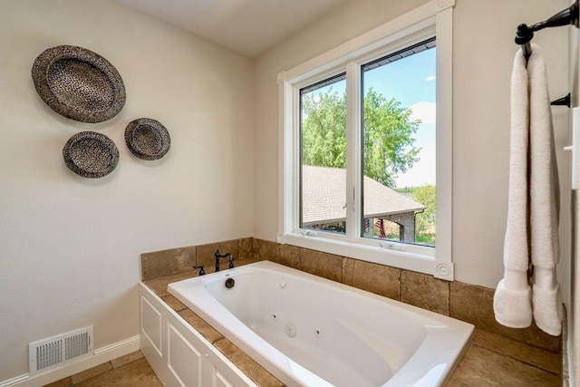 24534 474th Ln, Elysian Twp, MN 56028 - full bathroom featuring a tub with jets and baseboards