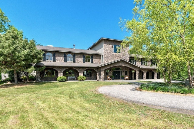 24534 474th Ln, Elysian Twp, MN 56028 - view of front of house with a front lawn and curved driveway