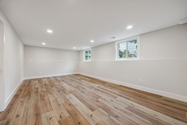 3936 Quail Ave N, Robbinsdale, MN 55422 - spare room with light wood finished floors, recessed lighting, and baseboards