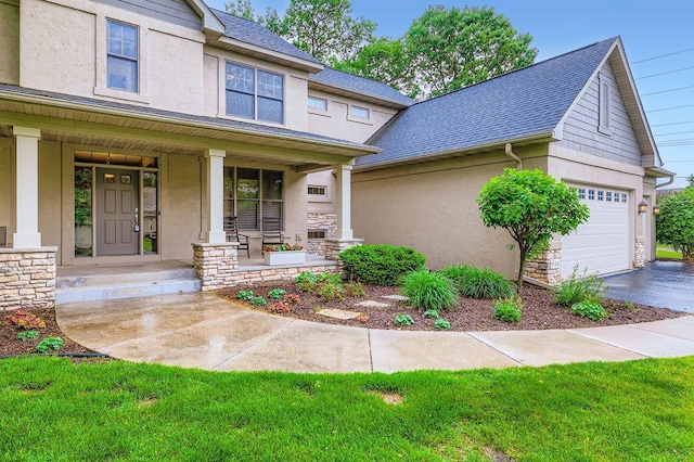 946 Wild Rose Ct, Eagan, MN 55123 - view of front facade with covered porch, stucco siding, and stone siding