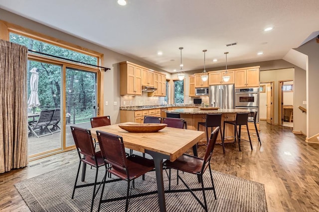 946 Wild Rose Ct, Eagan, MN 55123 - dining space with recessed lighting and light wood-style floors