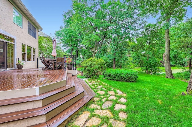 946 Wild Rose Ct, Eagan, MN 55123 - view of green lawn featuring outdoor dining space and a wooden deck