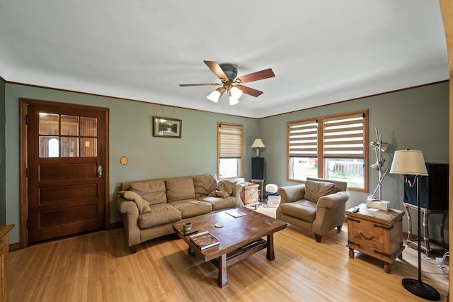 967 Stryker Ave W, Saint Paul, MN 55118 - living room with a ceiling fan, light wood-type flooring, and crown molding