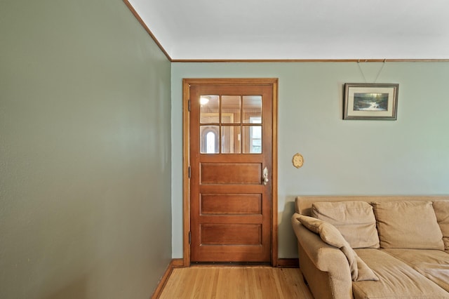 967 Stryker Ave W, Saint Paul, MN 55118 - entryway with light wood-style floors and crown molding