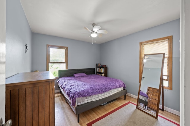 967 Stryker Ave W, Saint Paul, MN 55118 - bedroom with light wood-style flooring and ceiling fan