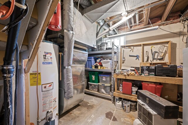 967 Stryker Ave W, Saint Paul, MN 55118 - below grade area featuring water heater and a workshop area