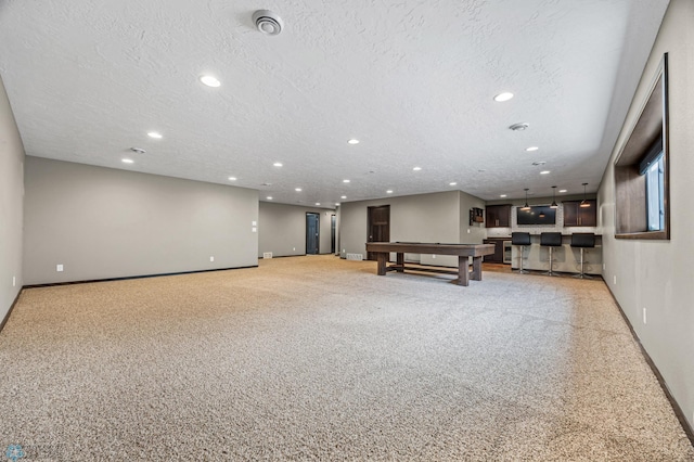 2800 Mcleod Dr E, West Fargo, ND 58078 - playroom featuring baseboards, recessed lighting, billiards, light carpet, and a textured ceiling