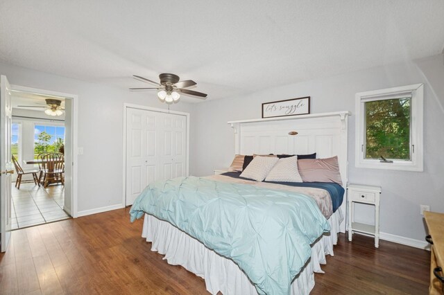 6198 210th Ave SE, Lake Lillian Twp, MN 56253 - bedroom featuring wood finished floors, baseboards, and ceiling fan