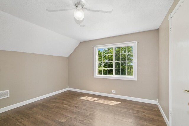 6198 210th Ave SE, Lake Lillian Twp, MN 56253 - additional living space with lofted ceiling, baseboards, wood finished floors, and ceiling fan