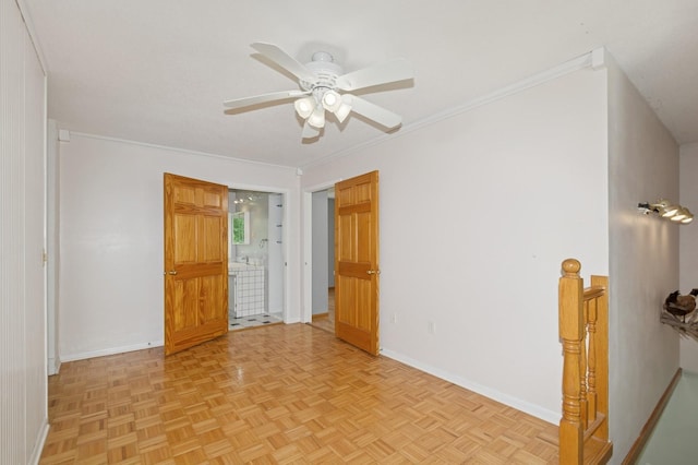 6198 210th Ave SE, Lake Lillian Twp, MN 56253 - unfurnished room featuring baseboards, crown molding, and a ceiling fan
