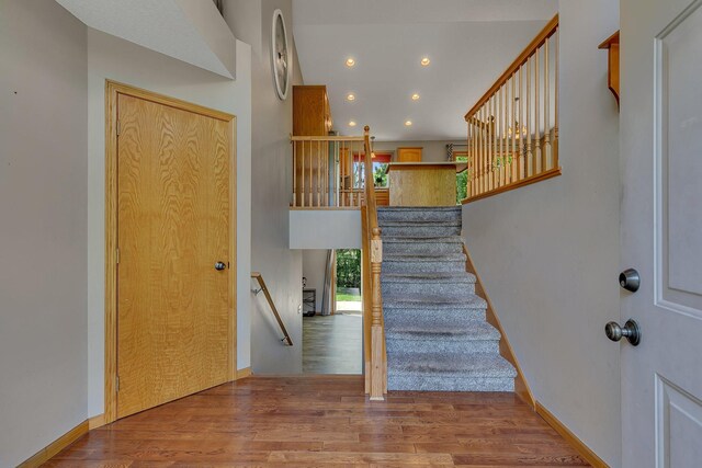 2821 15th Ave S, Saint Cloud, MN 56301 - stairs with wood finished floors, recessed lighting, and baseboards