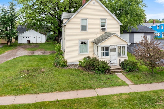 208 2nd St SW, Braham, MN 55006 - traditional home featuring a front lawn, a chimney, an outbuilding, and a shingled roof