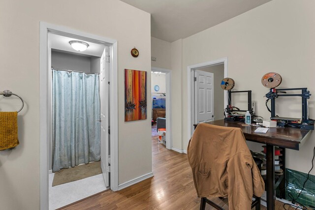 208 2nd St SW, Braham, MN 55006 - home office featuring wood finished floors and baseboards