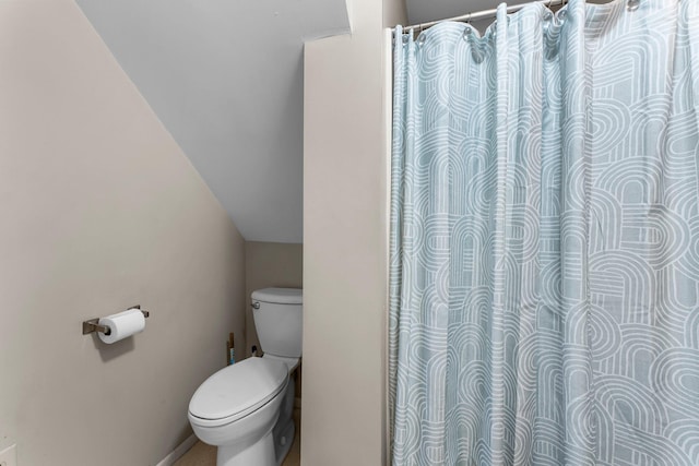 208 2nd St SW, Braham, MN 55006 - bathroom with toilet, a shower with curtain, and baseboards