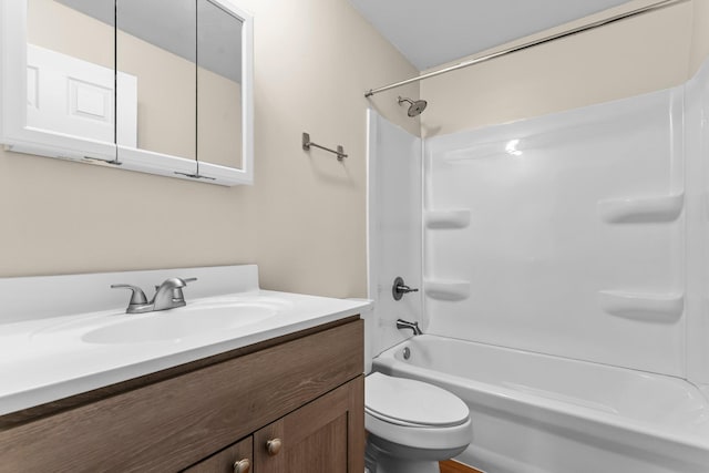 179 Little Canada Rd E Unit 230, Little Canada, MN 55117 - bathroom featuring vanity, shower / bathtub combination, and toilet