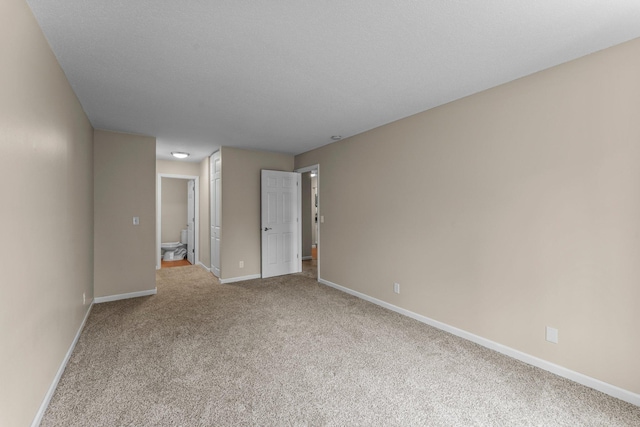 179 Little Canada Rd E Unit 230, Little Canada, MN 55117 - unfurnished room with carpet flooring and baseboards