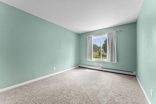 179 Little Canada Rd E Unit 230, Little Canada, MN 55117 - unfurnished room with a baseboard radiator, carpet, baseboards, and a textured ceiling